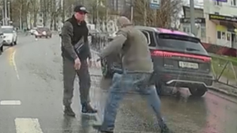 Driver Punches Man In The Face During Road Rage Incident In Russia