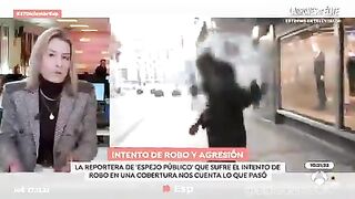 African Migrant Robs Female Reporter Live on TV and Threatens to Kill Her.