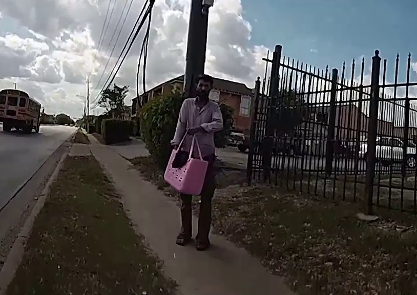 Man pulls gun ouut of Pink Bag, Bad Idea bro