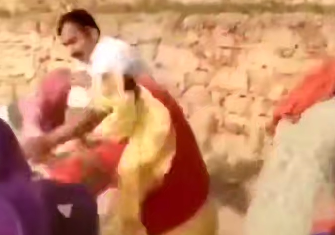 In India, a group of women beat a rapist with sticks until he was half-dead