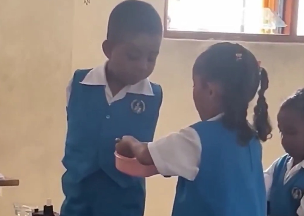 In Brazil, a 5-year-old girl was captured on video feeding lunch to her classmate, who was born without arms.