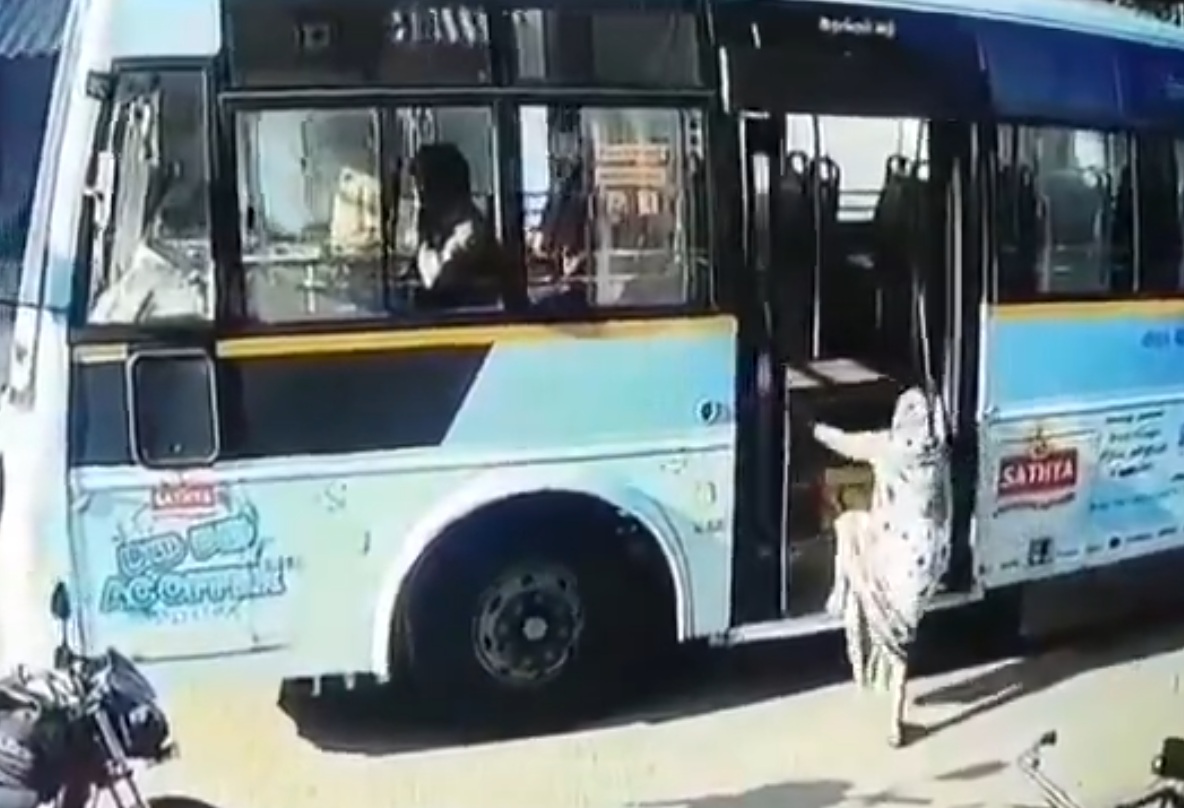 India | An elderly woman lost her life after falling from a bus when the driver pulled away while she was still boarding.