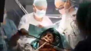 Woman plays the Violin during Brain Surgery for a Reason..See Description