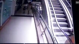 Woman Drops her Baby while on the Escalator..See Description