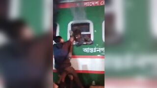 Man Stuck in Train as He Burns Alive, Man trying to Help