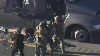 SWAT Team Smashes Truck, Only to Arrest Driver