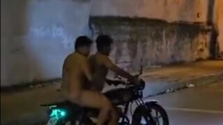 Just 2 Naked People on Motorcycle who Drive Away from Cops