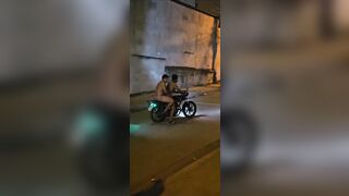 Just 2 Naked People on Motorcycle who Drive Away from Cops
