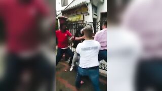 Good Girlfriend tries to Stop her Man from being Jumped by Everyone