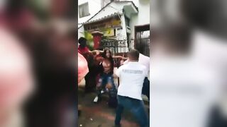 Good Girlfriend tries to Stop her Man from being Jumped by Everyone
