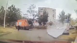Garbage Truck Driver Fails to See the 2 Girls Holding Hands trying to Cross