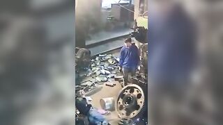 Little Worker in China has hand Crushed by Huge Gear...but Lucky it Missed Him