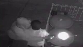 ALERT: Security footage shows a man fighting with a robber before being shot