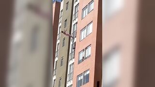 Woman does Perfect Backflip off Building in Colombia to End It