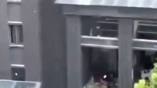 Man Jumps off Building and he lands on Someone's Table Dining Inside Restaurant