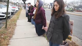 Christendom college students pray the Rosary on their knees outside an abortion clinic in Virginia