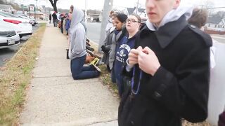 Christendom college students pray the Rosary on their knees outside an abortion clinic in Virginia