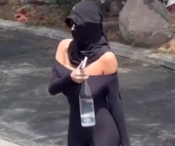 At this point Kanye's wife is just freelancing as a public art installation