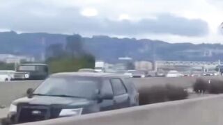 Police Officers shut down a bike takeover on San Francisco’s Bay Bridge