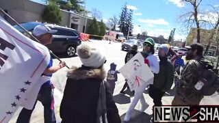 Pro Trump protestors confront an antagonizing leftist wearing a Luigi Mangione outfit