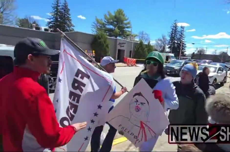 Pro Trump protestors confront an antagonizing leftist wearing a Luigi Mangione outfit