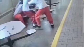 Inside Job: Black Inmates are Helpless to Fight Back Handcuffed to Table, Stabbed by White Boy (See Context)