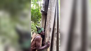 Tanzanian tribal man goes viral for using his teeth to “extract medicine” from a tree