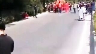 Truck loses Control Running over a Procession for a festival in China.