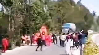 Truck loses Control Running over a Procession for a festival in China.