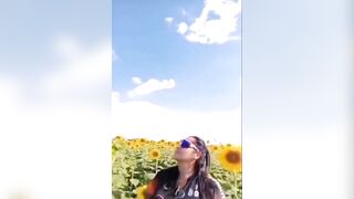 Woman Admiring the Most Beautiful Sunflowers in Venezuela (2 Angles of Video)