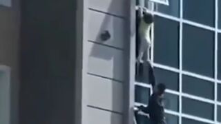 True Hero saves a Child who Climbed Out the Window for Fun