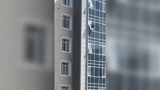 True Hero saves a Child who Climbed Out the Window for Fun