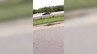 Black Guy with Smiling White Girl tries to Run Down Motorcyclist