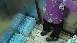 Asian Woman stuck in Elevator makes It Fatally Worse