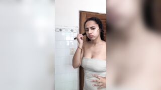 Beautiful Cuban Girl gets Even More Beautiful with just a Bucket of Water
