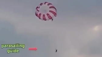 A parasailing instructor died after falling from a height of around 50 meters