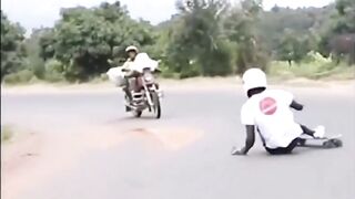 Roller Skater hits Full Size Motorcycle (Watch Slow Motion)