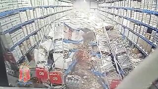 Alcohol Warehouse in Russia Collapses....How did they even Clean this Up? (See Description for News)
