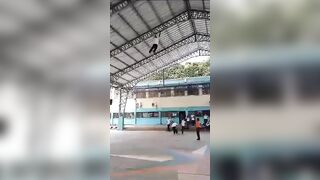 Ecuador: Student trying to Show Off and Lets Go, Both Legs Broken
