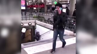 In France, Migrant on his Phone just Casually Pushes Woman Down Concrete Steps