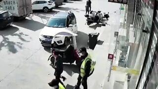 China: A security Guard is Hit by a Runaway Tire..Couple Seconds to Live
