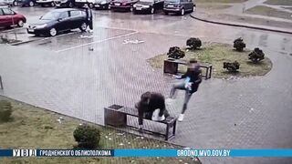 Belarus: Complete POS Kicks Elderly man in the Back causing Him to Hard Land on his Neck