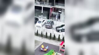 What a Jerk...Man Suicide Lands on Top of Car but seems to be Fine?