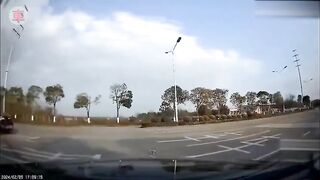 Motorcyclist is Blown Away after Collision and then Run Over