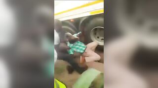 India: Head Stuck in Wheel Crease of Tractor Trailor..it comes out Flat