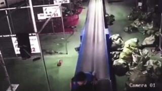 Oh No....Little Asian Worker gets Sucked into Conveyor System