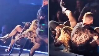 Someone Getting Fired!!!... Old Ass Madonna Wipes out When Dancer Pulls Chair too Quickly.. Lol