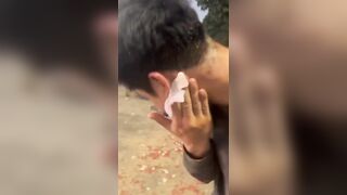 Stupid Chinese man playing with fireworks get burned