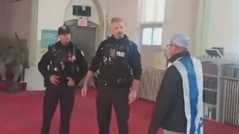 A man draped in an Israeli flag entered a mosque in Toronto, Canada