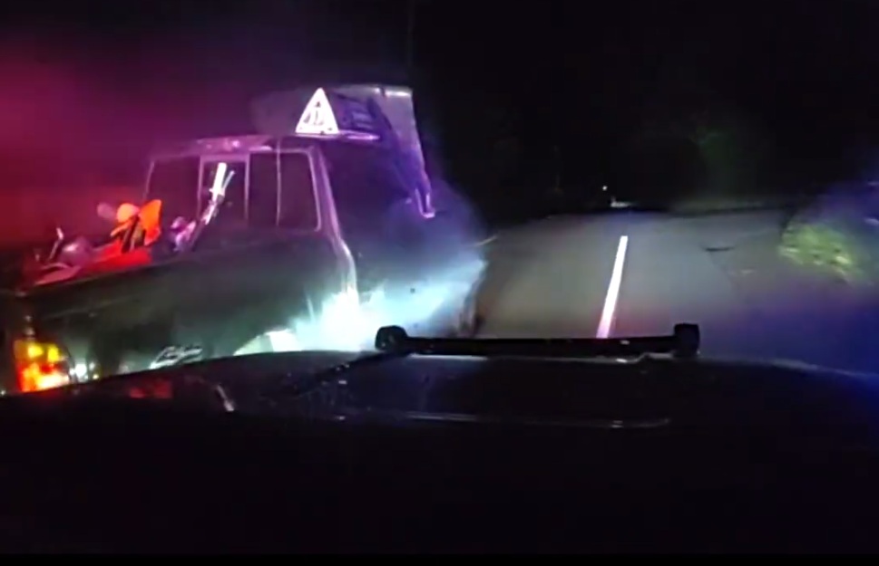 Driver Flees While Hood Up